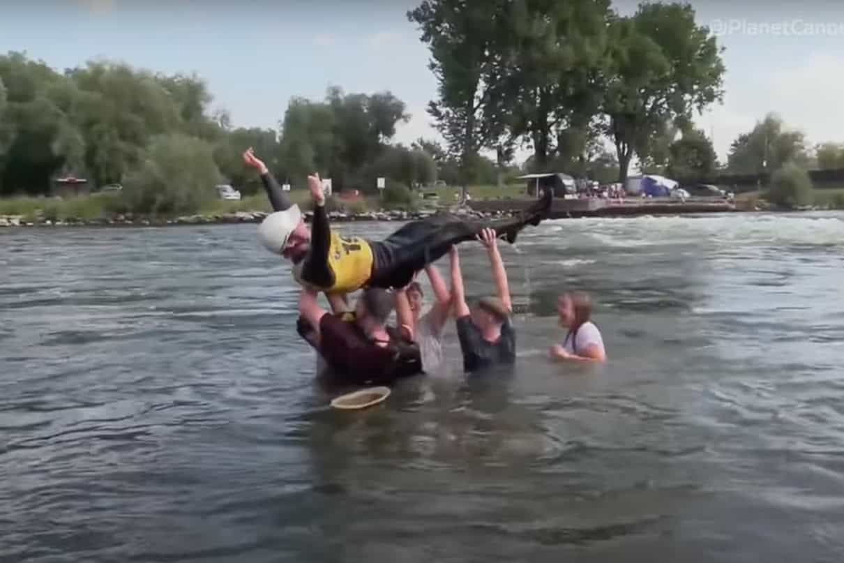 Sam Wilson emerges from a 19 second mystery move and sets a new world record in kayak squirt. Image: Planet Canoe | YouTube